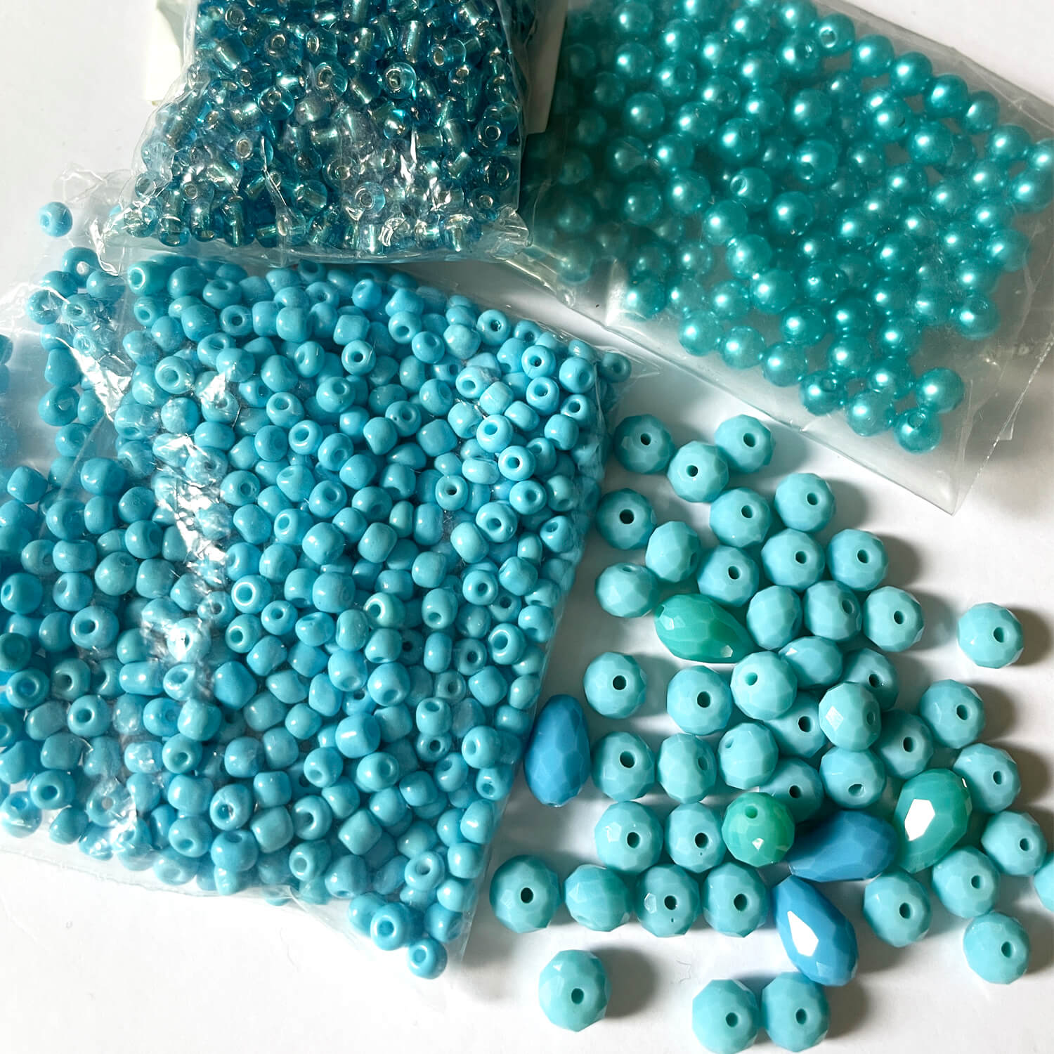 Aquamarine Plastic Pearls – mixed sizes (approx. 200-250 pcs.)